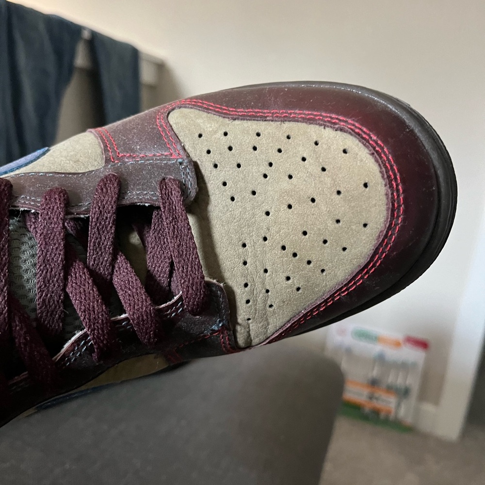 Nike high tops. Excellent condition. Green, burgundy & metallic blue swoosh.